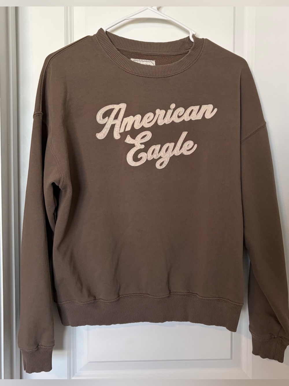 American Eagle Outfitters Brown Crewneck Sweatshirt with Cream Logo
Size XS